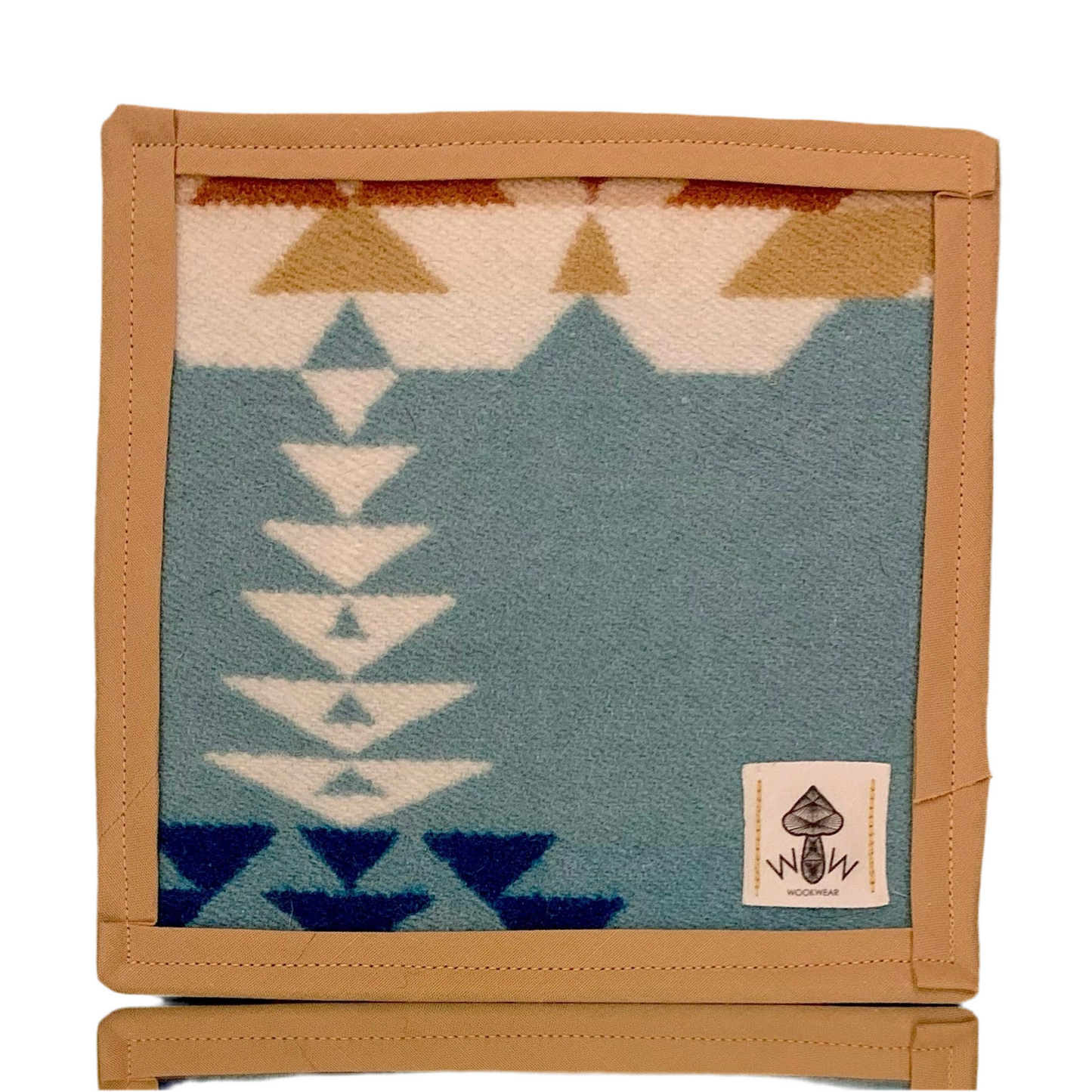 A rectangular Pendleton mat with a geometric pattern in blue and beige, featuring the Wook Wear logo.