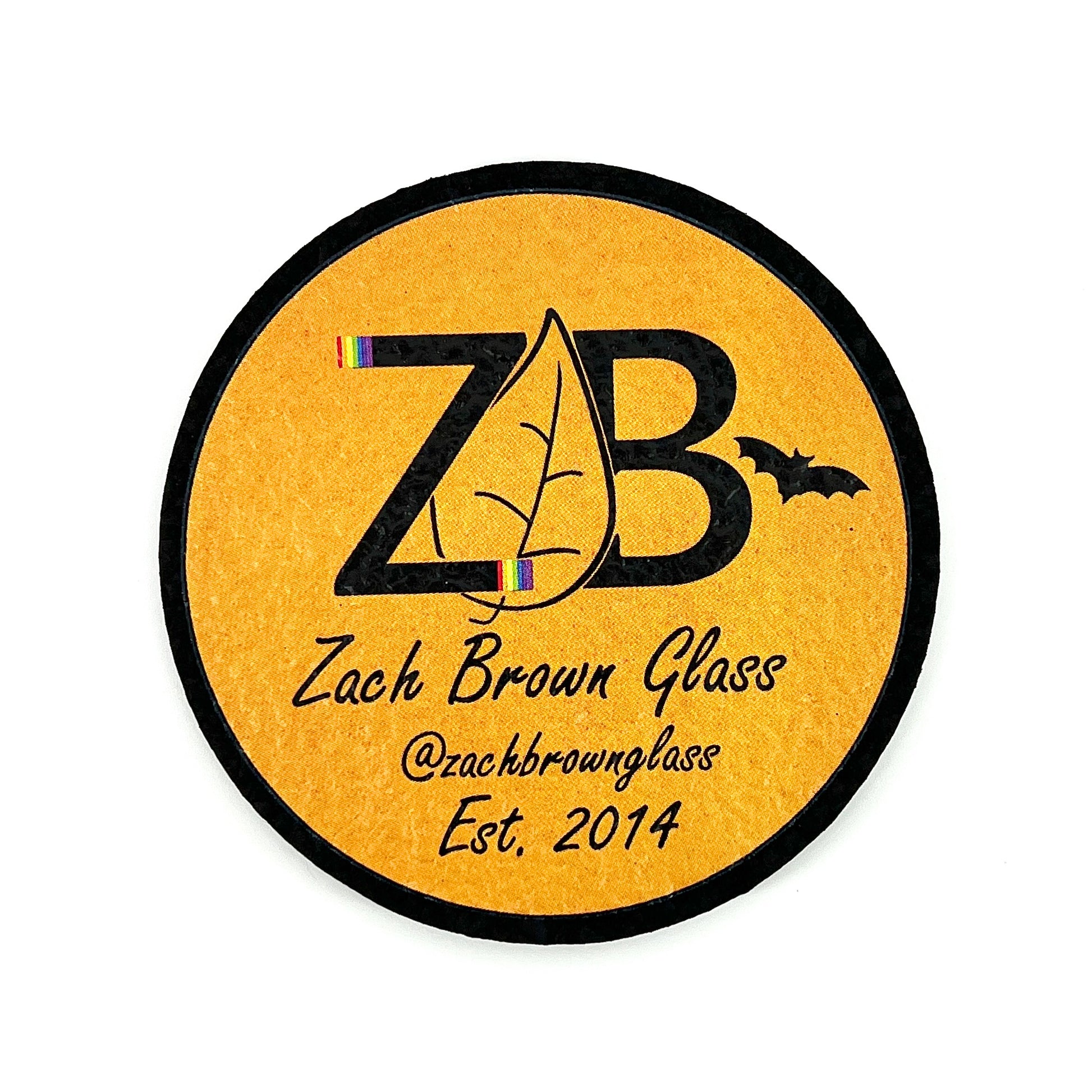 Round mat with 'ZB' logo and text on an orange background.
