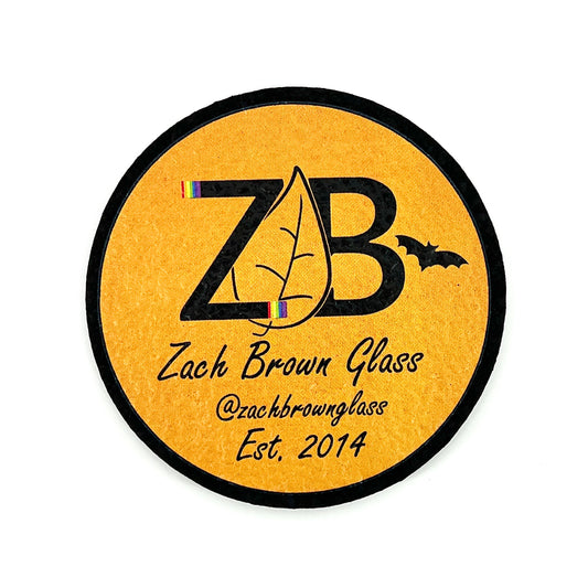 Round mat with 'ZB' logo and text on an orange background.