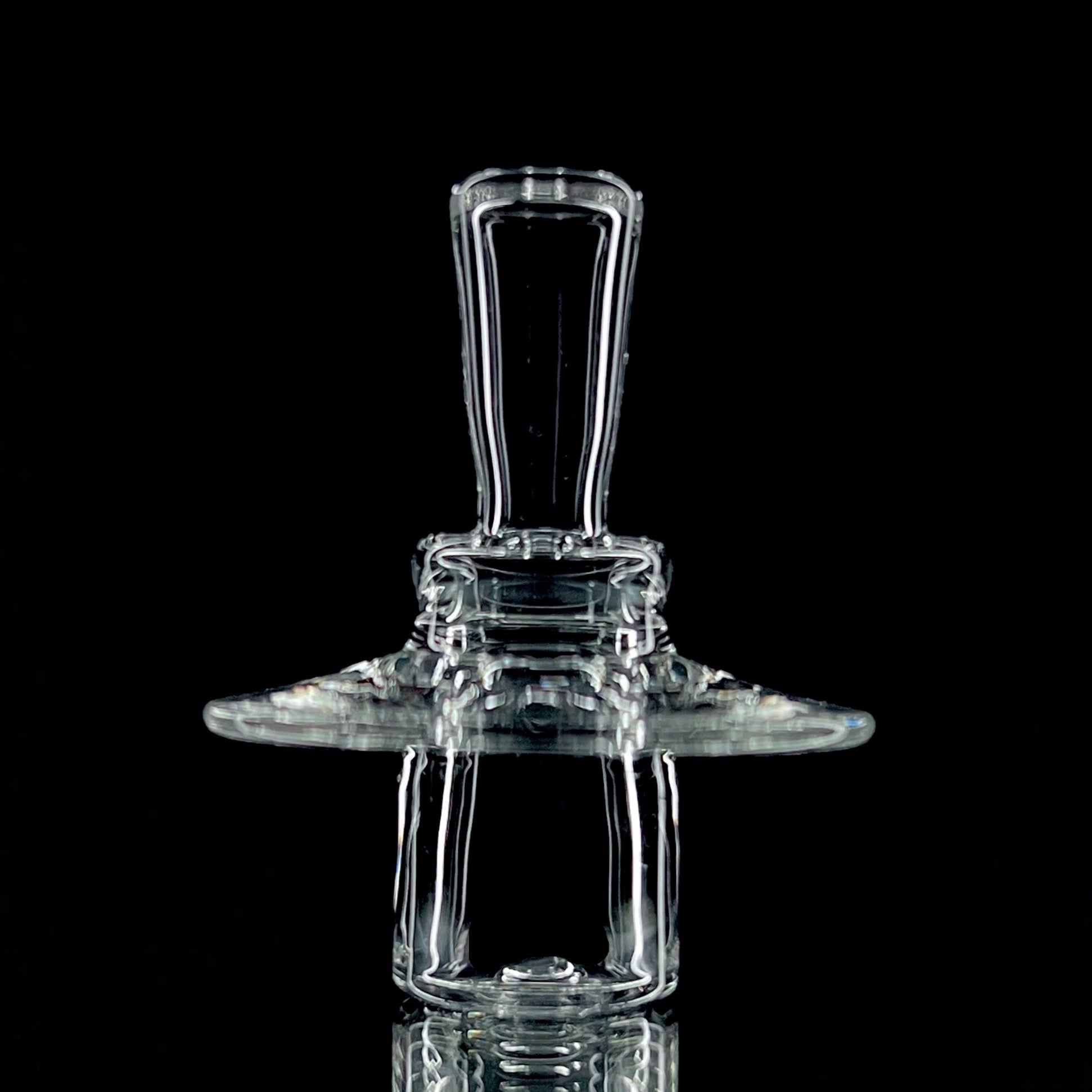 A clear glass 20mm V2 stopper for quartz slurpers, showing the side view with the fitted section.
